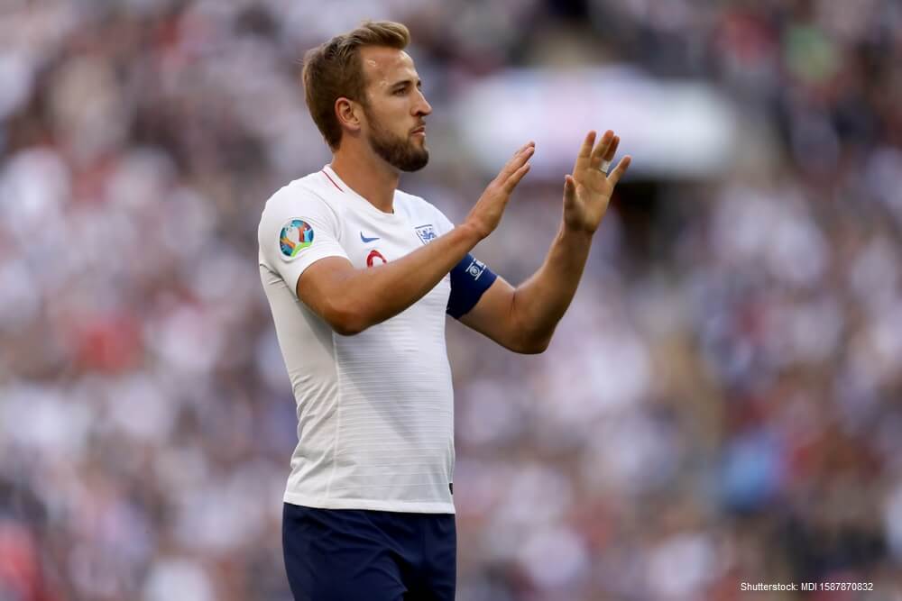 Harry Kane of England celebrates after scoring the opening goal